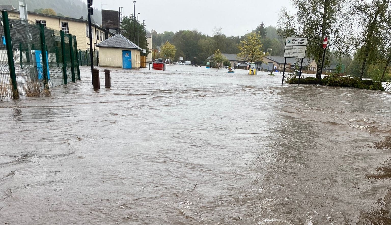 Search for man feared to have been washed away in flooded river